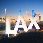 A large sign that says lax at night.